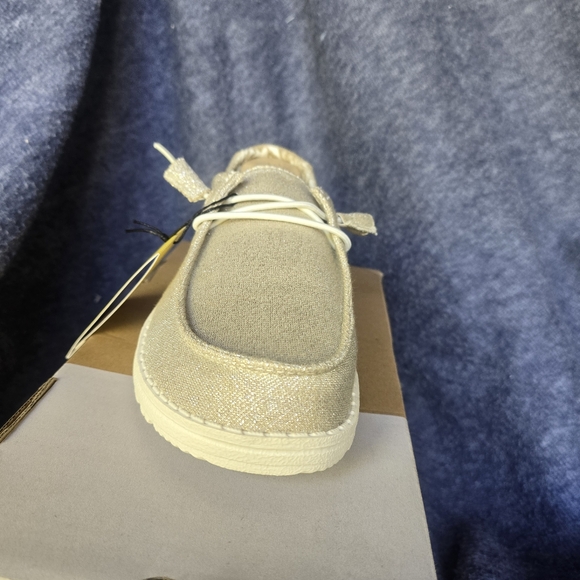 Ladies Hey Dude shoes. Gold shimmer color. - Picture 3 of 6
